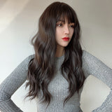 Xpoko 24-inch long curls with bangs, high-temperature silk material, and a versatile style for daily use