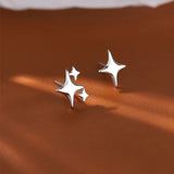 Xpoko Asymmetric Four-pointed Star Earrings for Women Silver Fairy Stud Jewelry