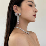 Xpoko Korean Luxury Elegant Pink Crystal Bowknot Drop Earrings for Women and Girls Fashion Rhinestone Long Jewelry