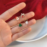 Xpoko Christmas Gifts 4 Pcs/set Cute Small Enamel Christmas Earrings for Women Trendy Santa Claus Elk Xmas Tree Stud Earrings Girls Party Jewelry Gift