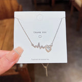 Xpoko Fashion Trend Unique Design Elegant Delicate Heart Zircon EKG Titanium Steel Clavicle Necklace Women's High Jewelry Party Gifts