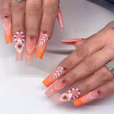 Xpoko 24Pcs Long Ballet Shiny Orange False Nails with Sequins Gradient Stripe Design Press on Nails Art Wearable Coffin Fake Nail Tips