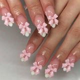 Xpoko 24Pcs Pink French Press on Nails 3D Bow Flower Pearl Design False Nails Short Almond Fake Nails Wearable Full Cover Nail Tips