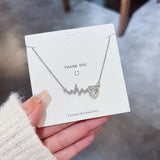 Xpoko Fashion Trend Unique Design Elegant Delicate Heart Zircon EKG Titanium Steel Clavicle Necklace Women's High Jewelry Party Gifts