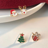 Xpoko Christmas Gifts 4 Pcs/set Cute Small Enamel Christmas Earrings for Women Trendy Santa Claus Elk Xmas Tree Stud Earrings Girls Party Jewelry Gift