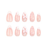 Xpoko 24Pcs Pink French Press on Nails 3D Bow Flower Pearl Design False Nails Short Almond Fake Nails Wearable Full Cover Nail Tips