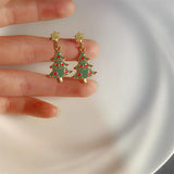 Xpoko Christmas Gifts Small Cute Christmas Tree Drop Earrings for Women Delicate Enamel Star Xmas Tree Pendant Earring Girls Holiday Versatile Jewelry