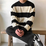 Xpoko New striped round neck sweater for men in autumn and winter loose lazy style sweater Korean style loose sweater, trendy jacket