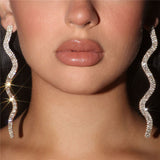 Xpoko Silver Long Drop Earrings with Sparkly Wavy Rhinestone Embellishments